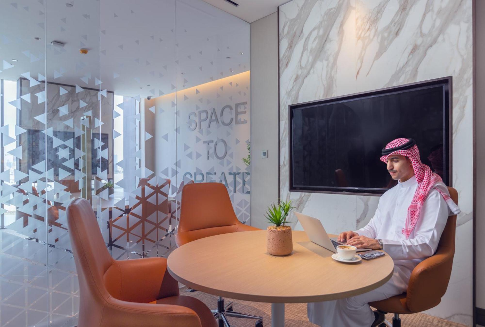 Onyx Rotana Manama Exterior foto A meeting room at the airport