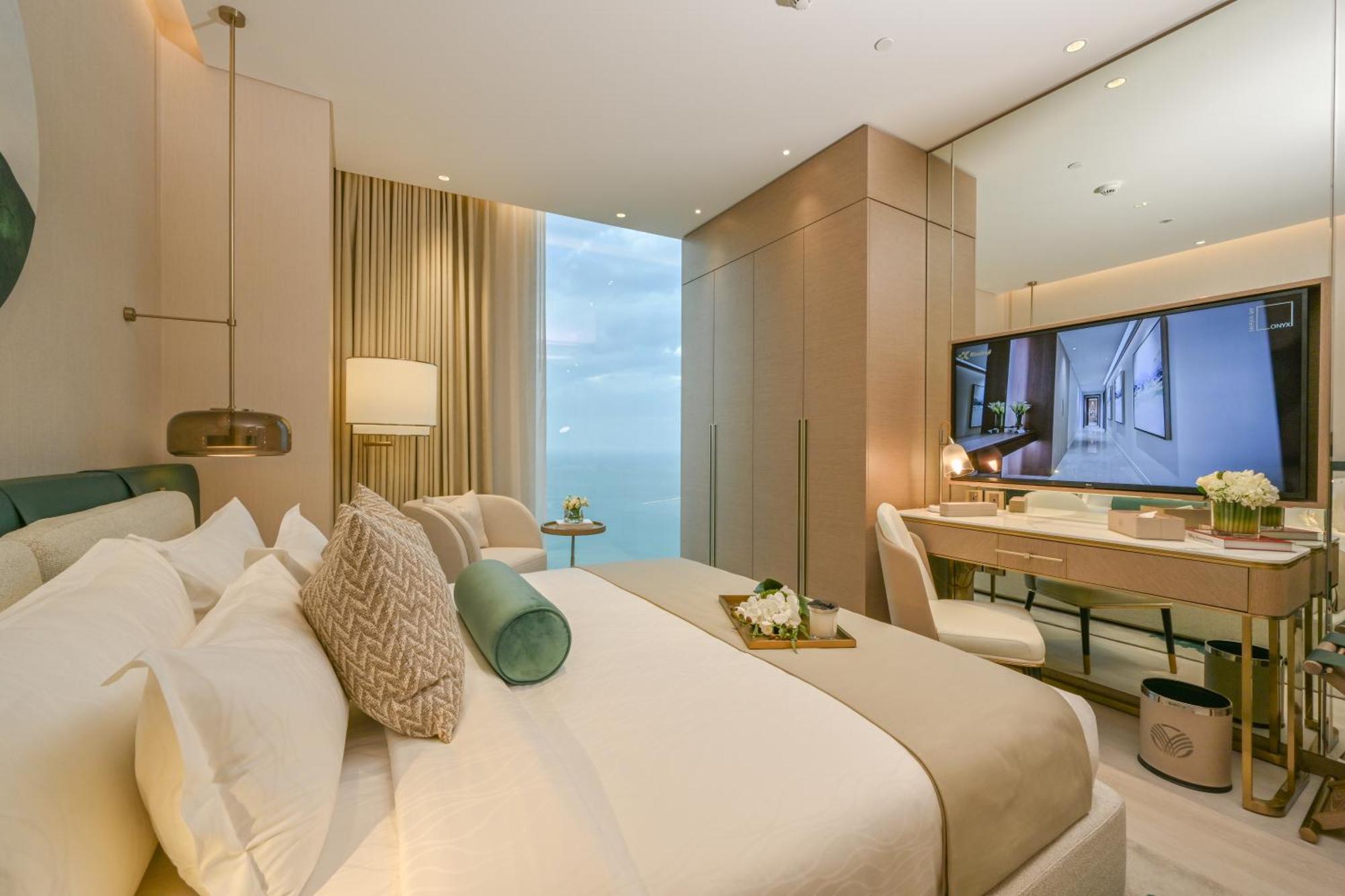 Onyx Rotana Manama Exterior foto A bedroom at the Ritz-Carlton, DIFC