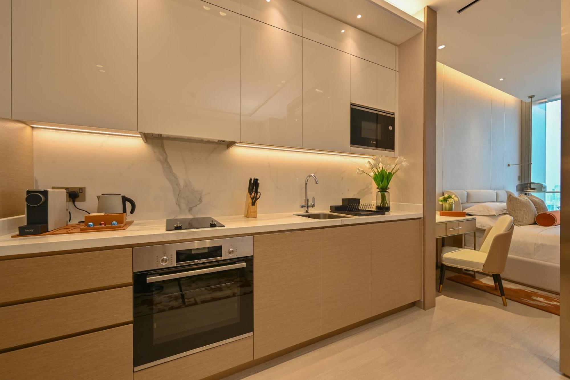 Onyx Rotana Manama Exterior foto A kitchen in a serviced apartment in Hong Kong